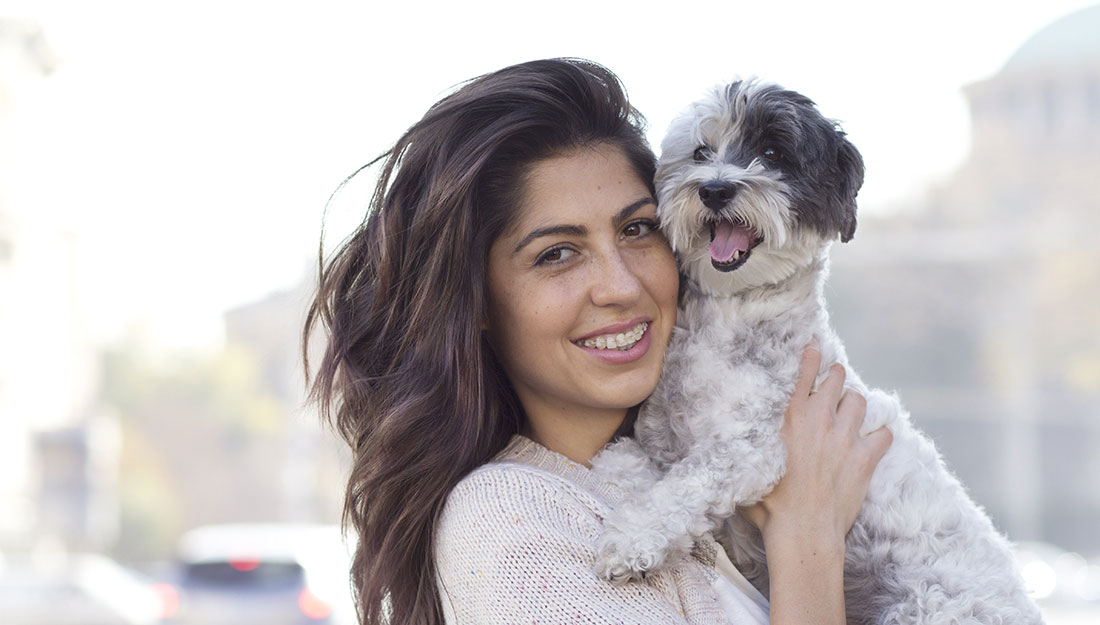 happy dog and dog owner