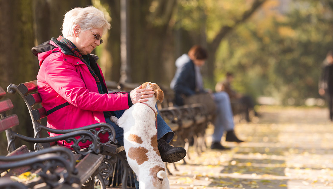 older woman with her dog
